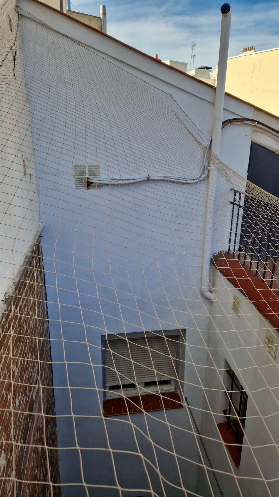 Restauración y pintura patio de luces